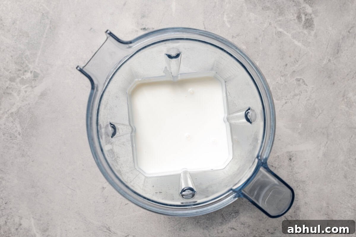 Blended cottage cheese inside the blender.