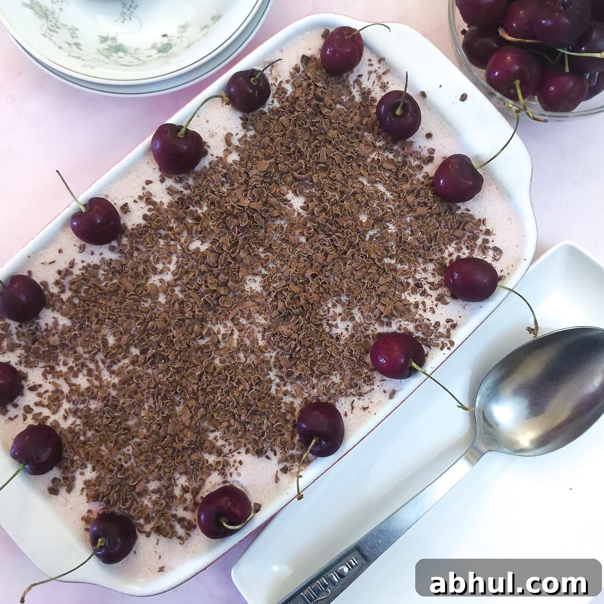 Step 9 - the finished dish, garnished with grated chocolate and fresh cherries.