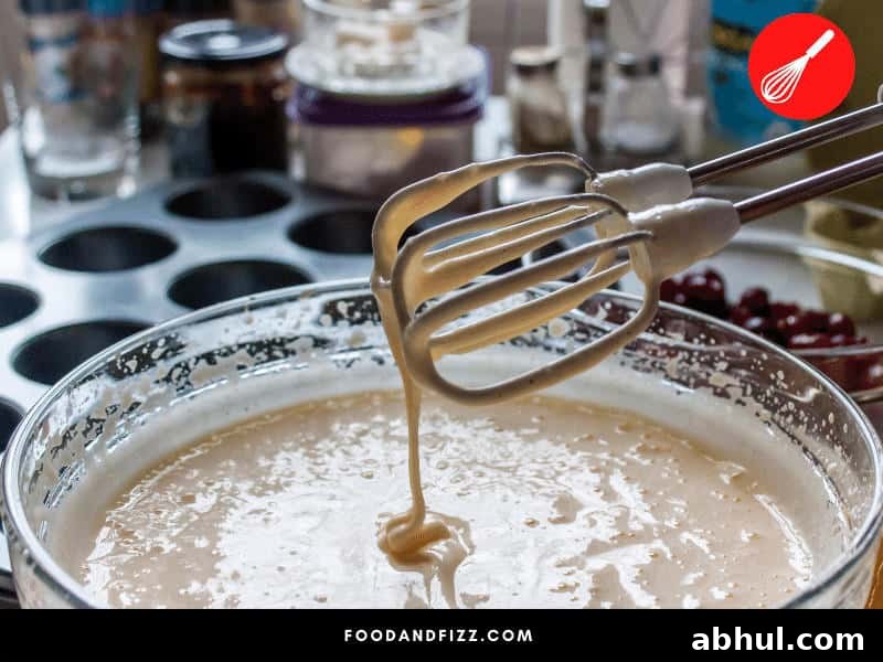 The more you mix your ingredients, the more air you incorporate, thus the lighter the batter will be.