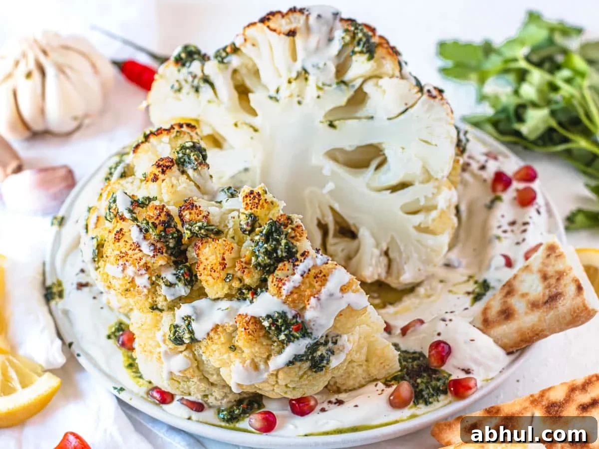 Whole roasted cauliflower with chermoula, pita bread and fresh lemon