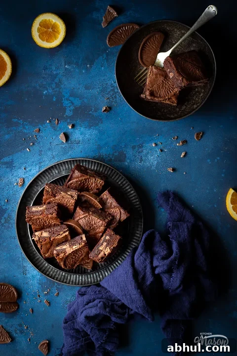 Chocolate orange brownies on a plate with a napkin