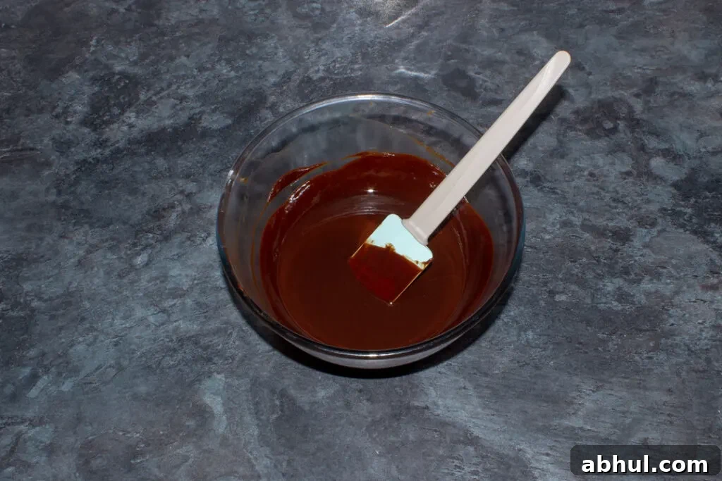 Melted butter and chocolate in a mixing bowl